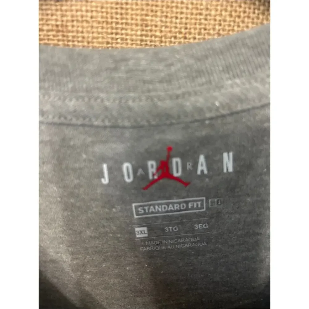Jordan Gray Short Sleeve Tee with Red Graphic